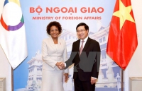 Le vice-Premier ministre et ministre vietnamien des Affaires étrangères et la secrétaire générale de la Francophonie. Photo: VNA - Vietnam+